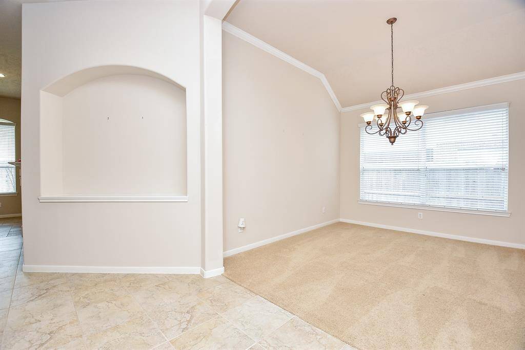 This gorgeous area off the main hallway is perfect as your formal dining space.