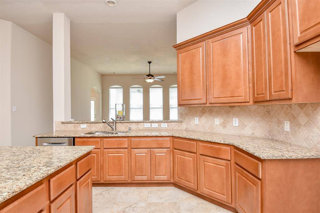 Angled counter space makes tasking even more comfortable and convenient, overlooking the living area for true socializing, even as you create culinary magic!