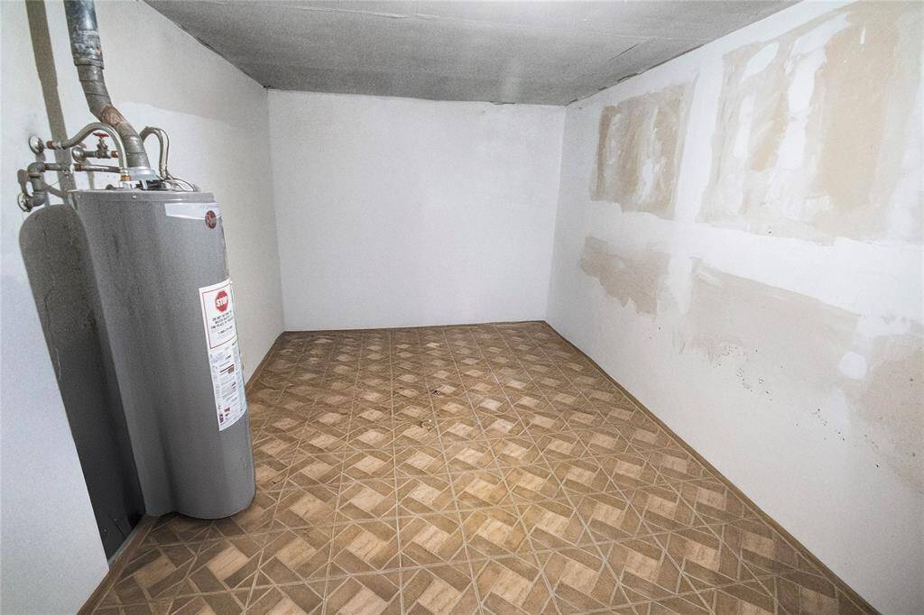 Convenient 18x11 laundry and storage space just off the kitchen.