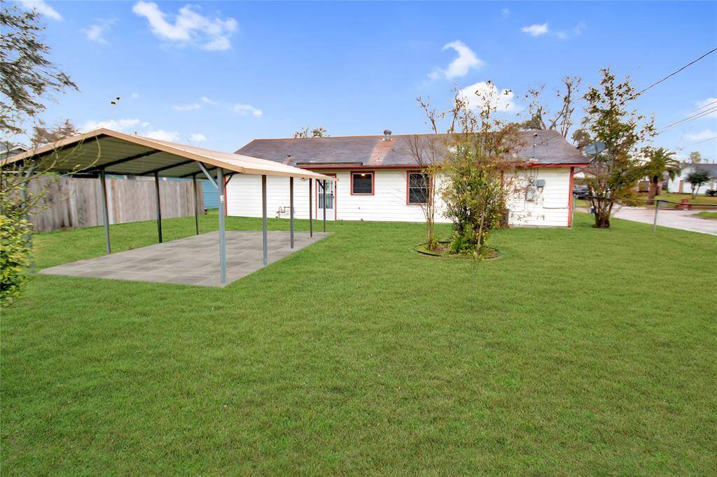 Spacious covered patio perfect for outdoor entertaining and relaxation.