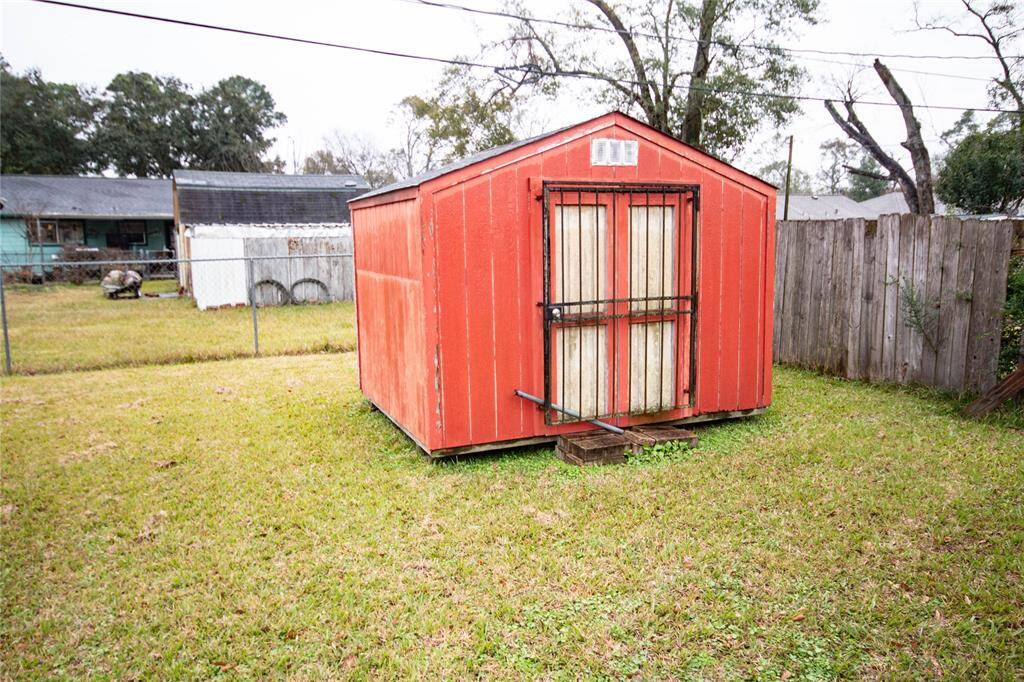Cozy backyard storage shed, perfect for organizing tools and outdoor equipment.