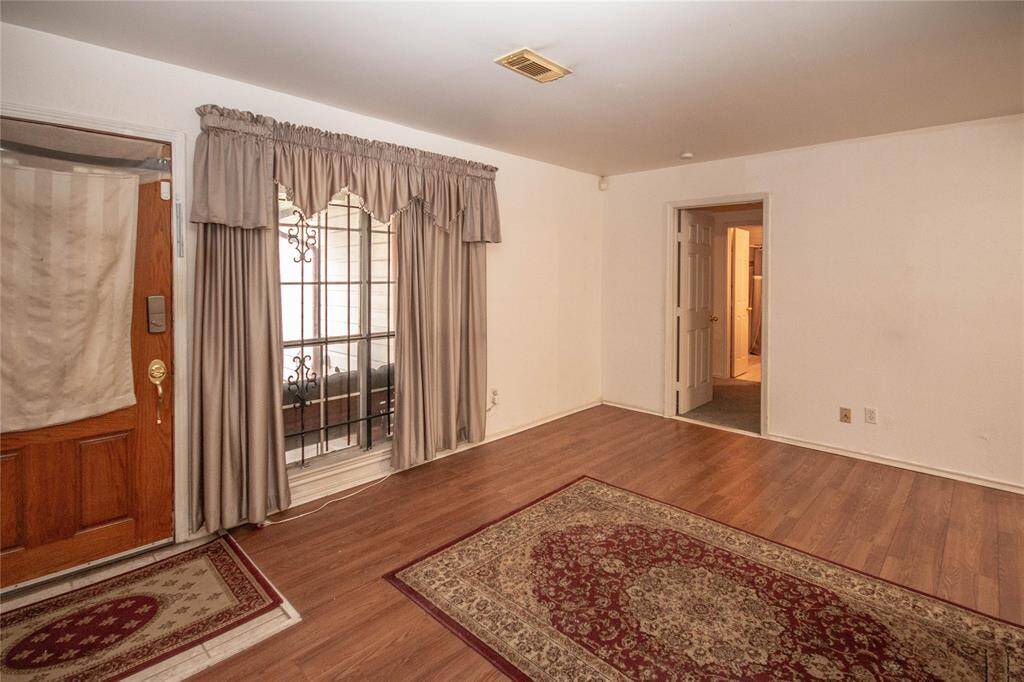Inviting living room with sleek laminate hardwood floors.