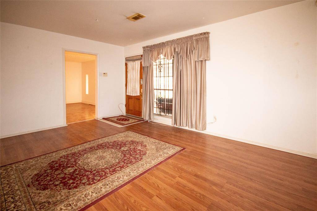 Enjoy seamless flow from dining to living in this inviting space.