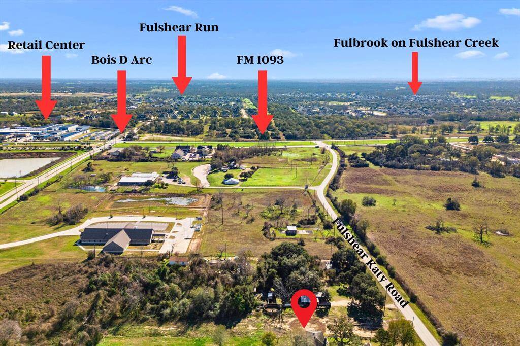The property is pinned for reference, highlighting its proximity to FM 1093 and the nearby subdivisions, making it an exceptional location with ample growth potential.