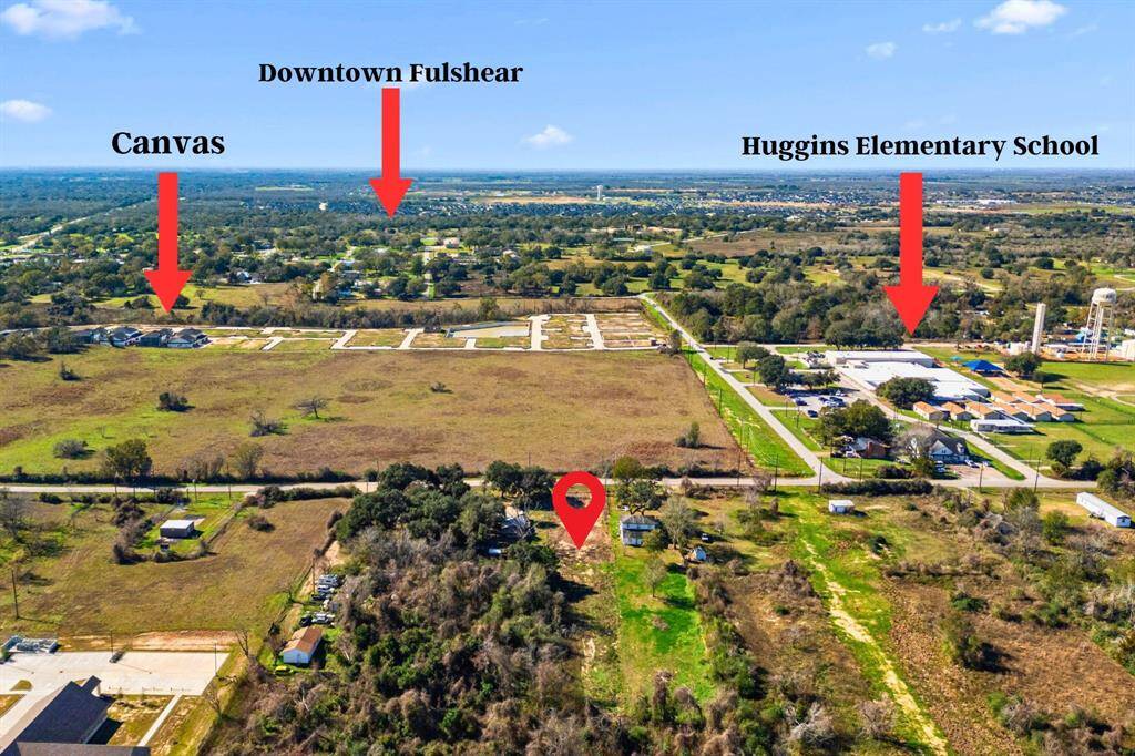 This view faces west, showcasing the property's location just a few blocks from Downtown Fulshear. The property is pinned for reference.