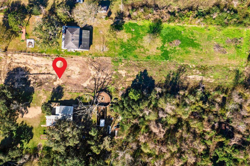 A bird's-eye view provides a straight-down perspective of the property, offering a clear visualization of its size and layout.