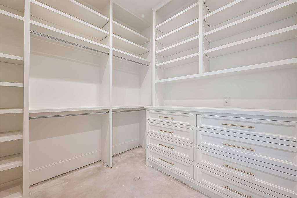 Primary Suite featuring custom-built woodwork for a warm and inviting retreat Designed.  Photos as of 03/20/2025.