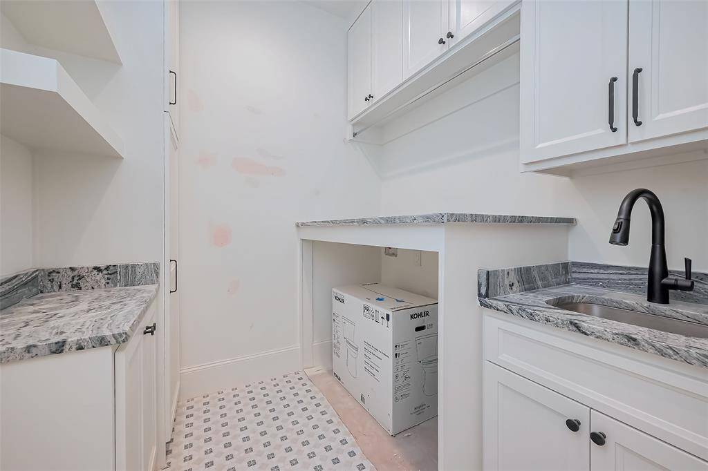 Laundry Room for efficiency and style. Photos as of 03/20/2025.