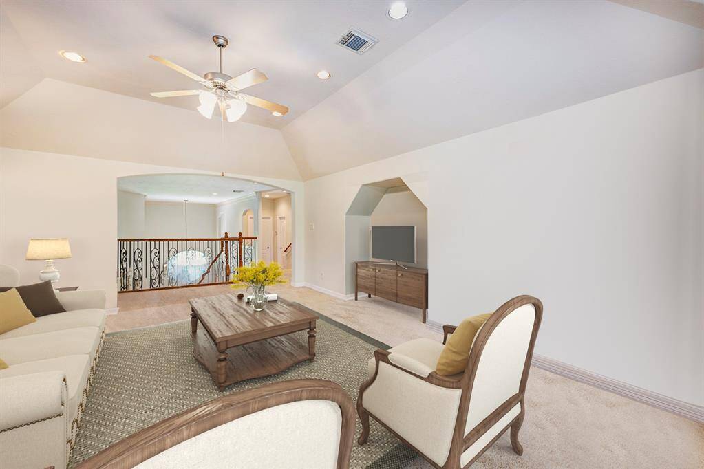 Additional game room view. Photo is virtually furnished.