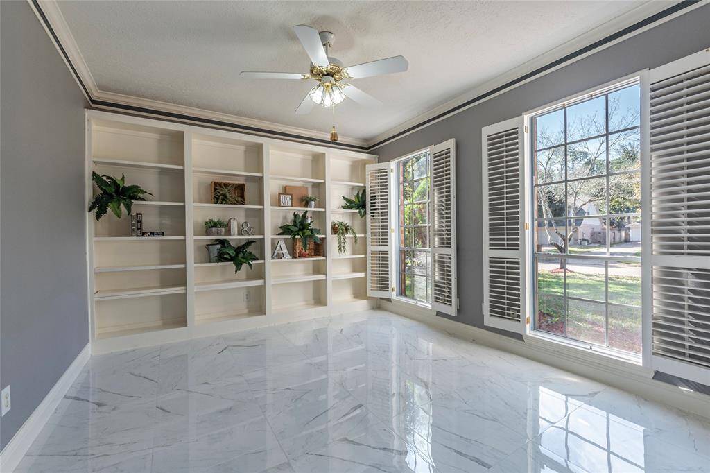 The home-office has a clean, sophisticated look with a neutral color scheme.
