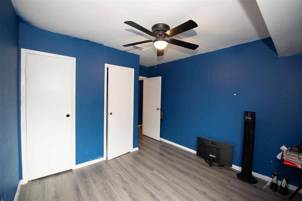 Room includes two spacious closets as well.