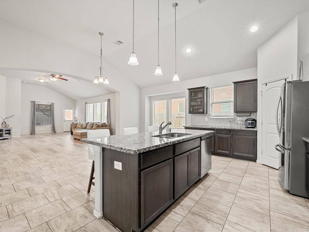 The open layout flows into a bright dining area with ample natural light.