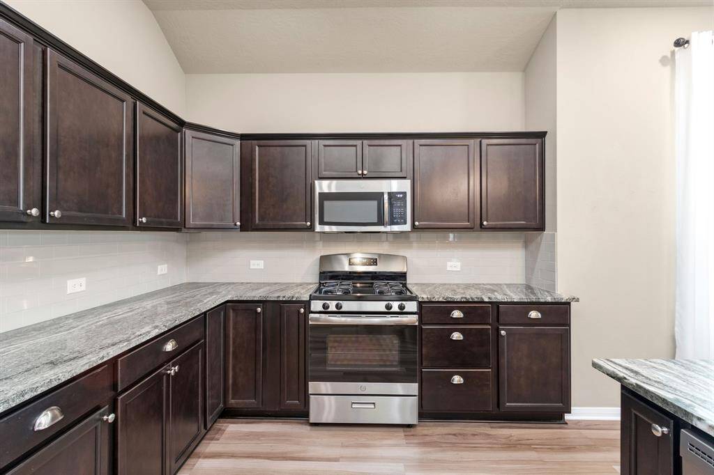 Notice all the cabinet and storage space in this kitchen!