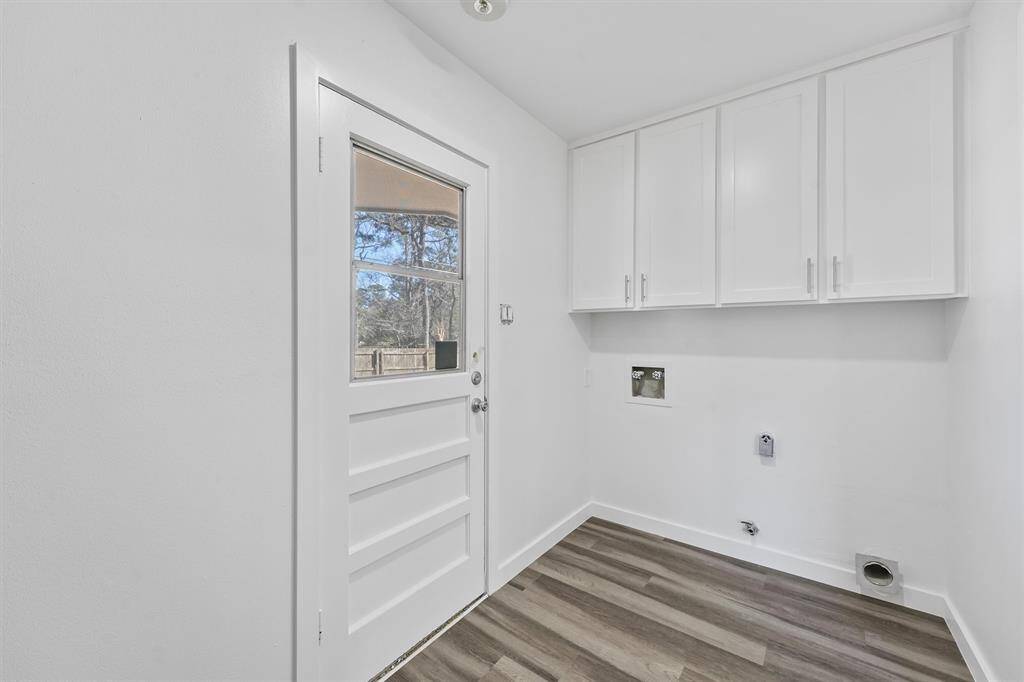 Laundry Room with door to backyard