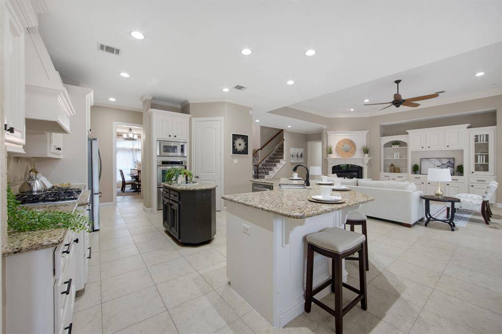 Expansive kitchen with modern elegance.
