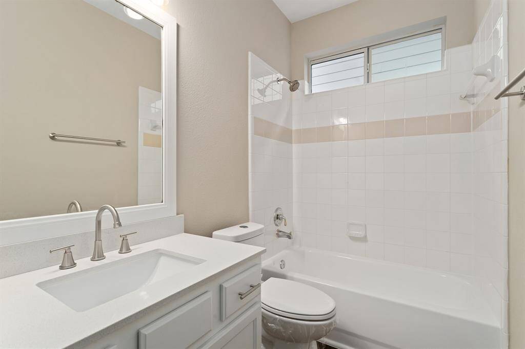 There is a full bathroom on the first floor PLUS a half bath!
