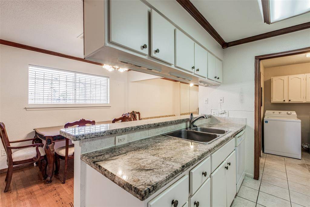 Windows that bathe the kitchen in natural light, creating a bright and inviting atmosphere.