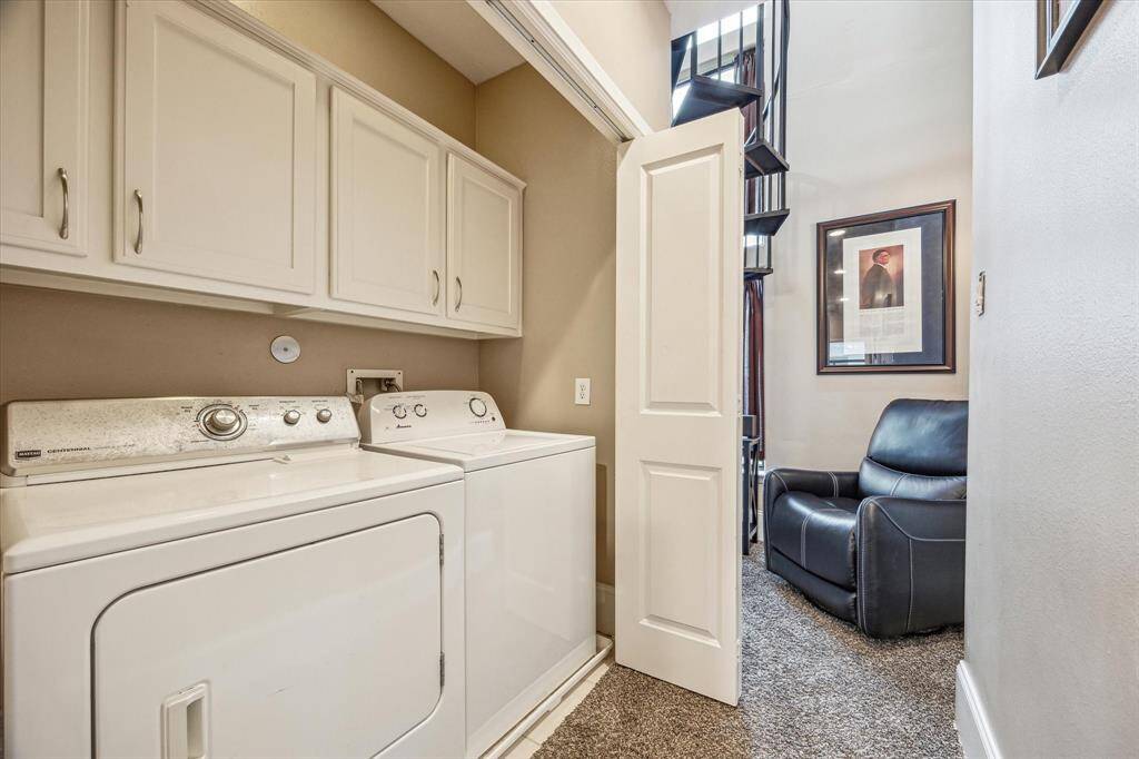 Utility room in the home, home comes equipped with washer and dryer
