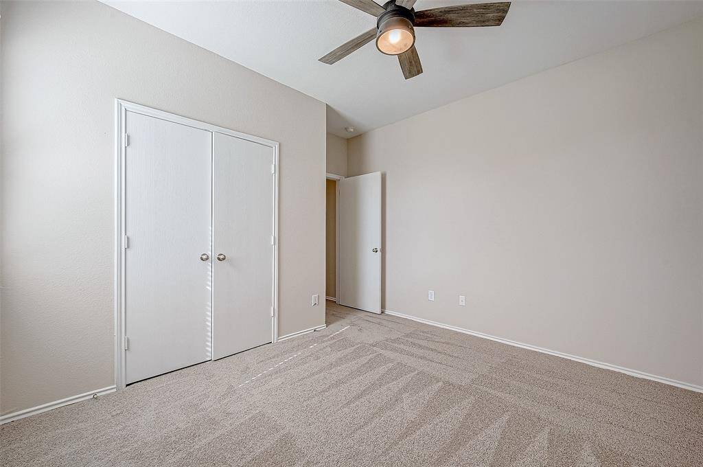 The double-door closet provides ample storage space, while the large window allows natural light to brighten the room. Perfect as a guest room, home office, or personal retreat, this versatile space is ready to meet your needs.