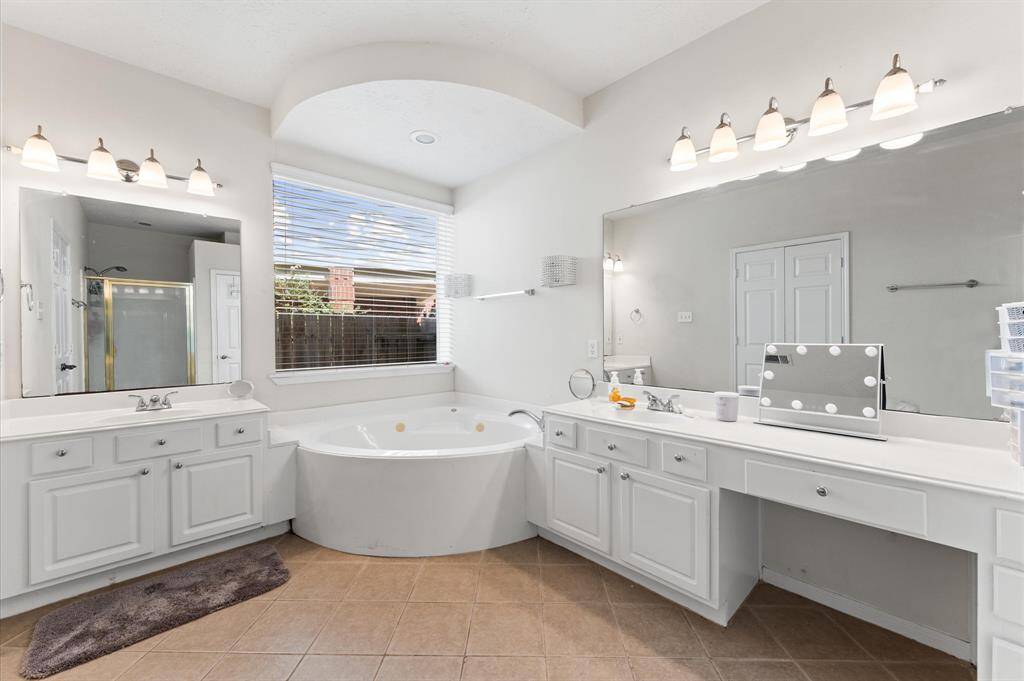 Primary Bathroom with separate tub and shower.