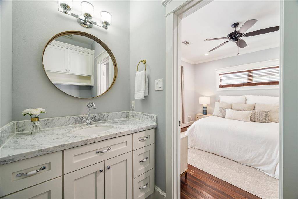 The ensuite half bath is a wonderful feature and includes marble counters and great storage.