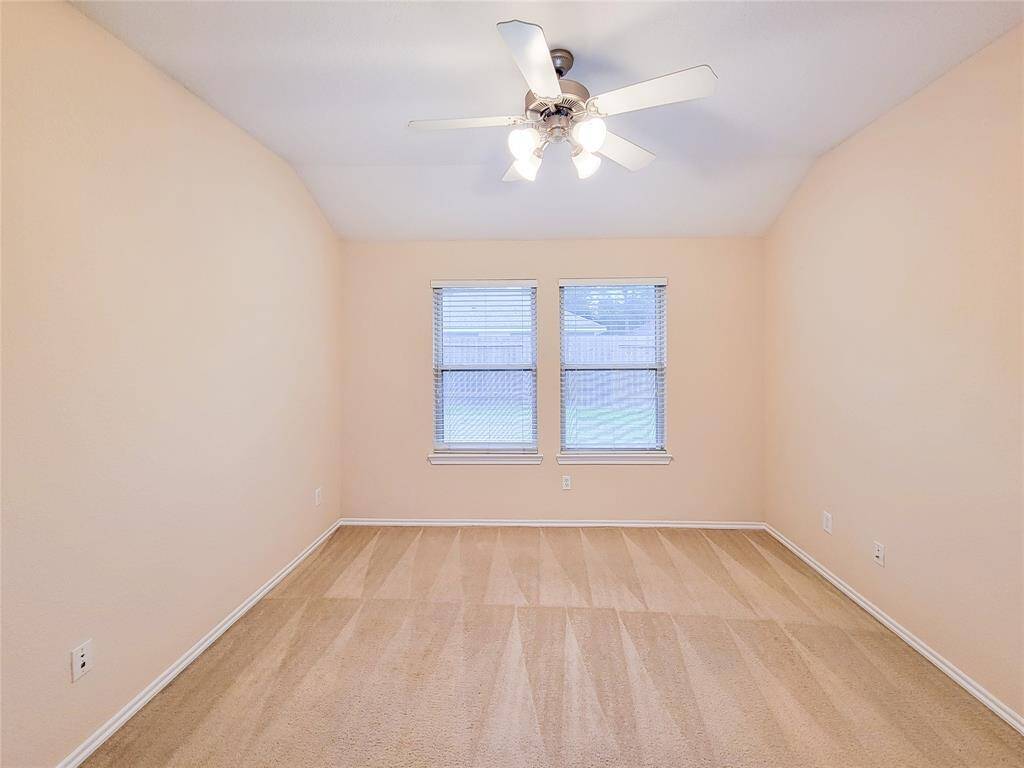Primary Bedroom with fan.