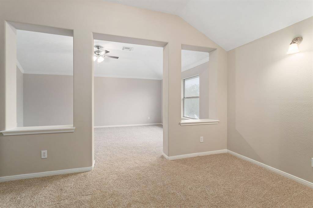 The primary bedroom includes a spacious sitting area!