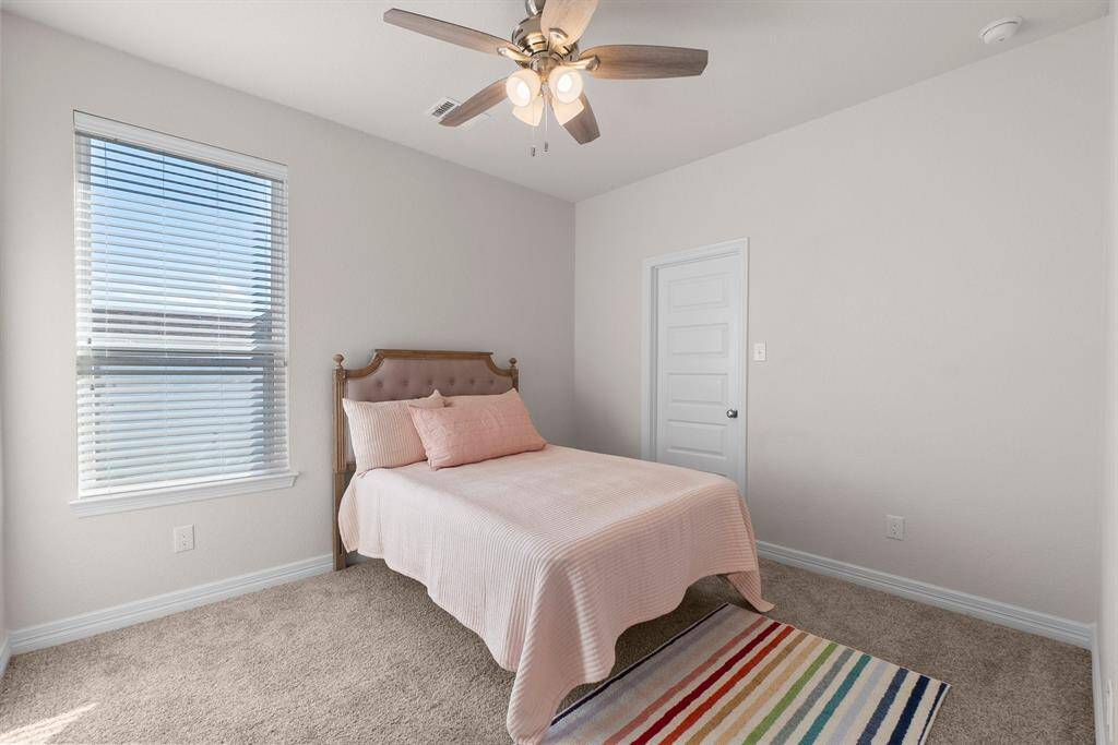 Secondary bedroom with walk-in closet
