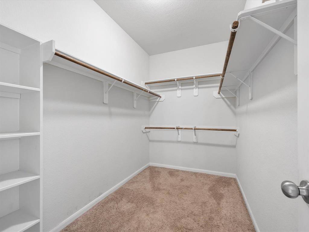 Primary walk in closet!