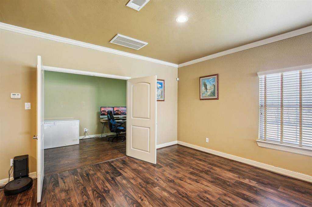Room used as office off of the living area