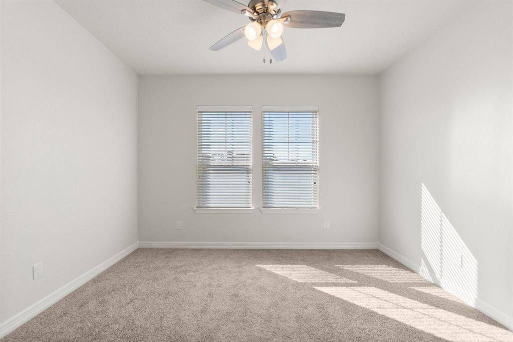 The 4th bedroom with great windows and upgraded ceiling fan