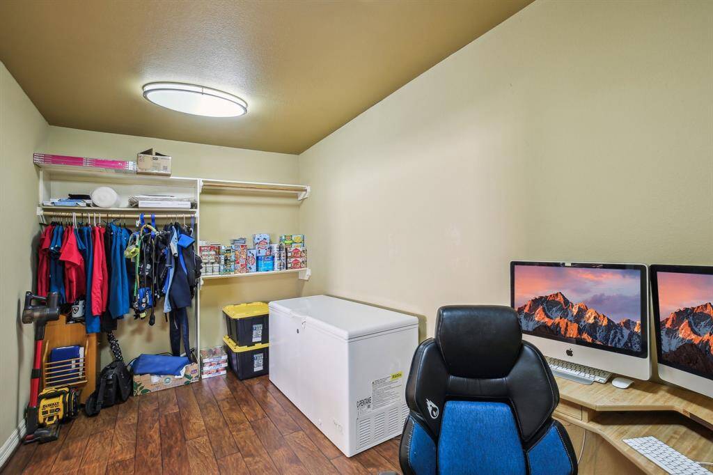 Room used as office off of the living area
