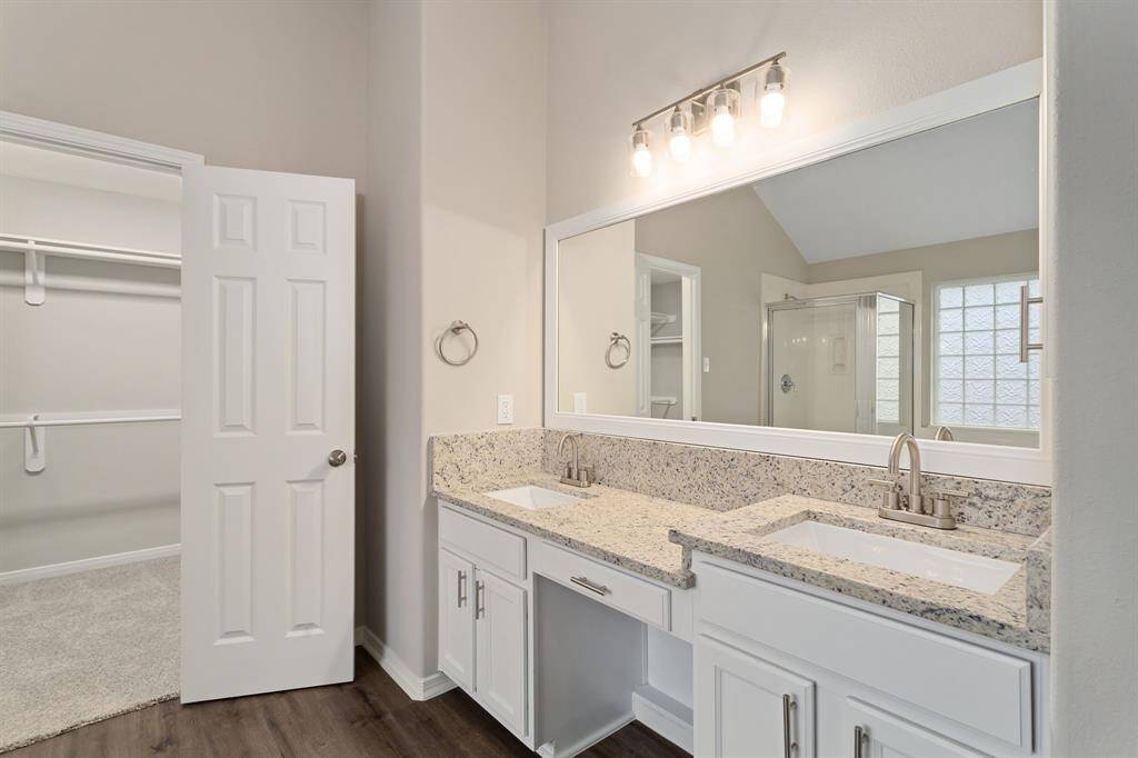 The primary bathroom features double sink areas!