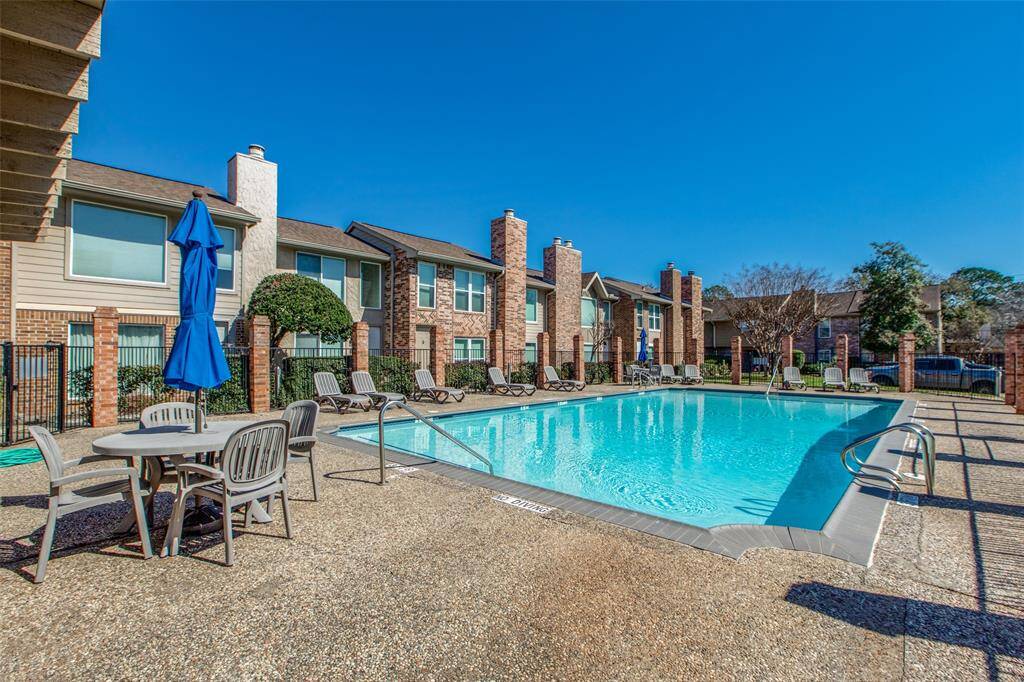 A sparkling community pool and sun deck provide a resort-like feel.