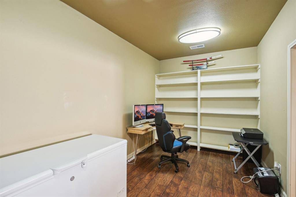 Room used as office off of the living area