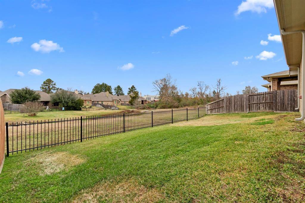 No back neighbors in this home. Green space is maintained by HOA.