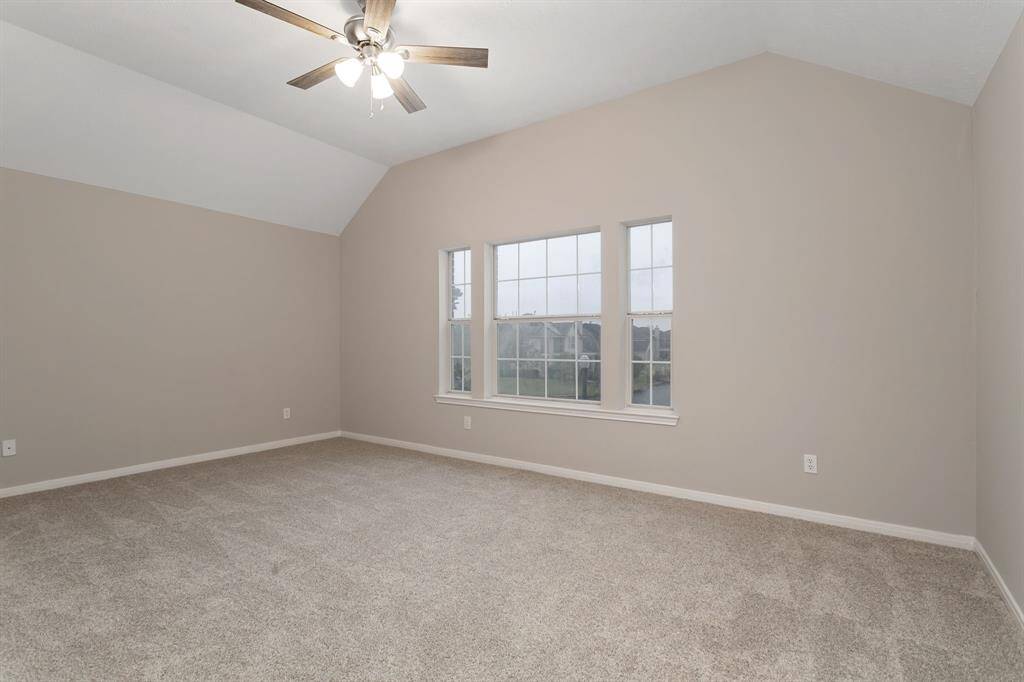 This secondary bedroom has an EN-SUITE BATHROOM and has a LAKE VIEW!