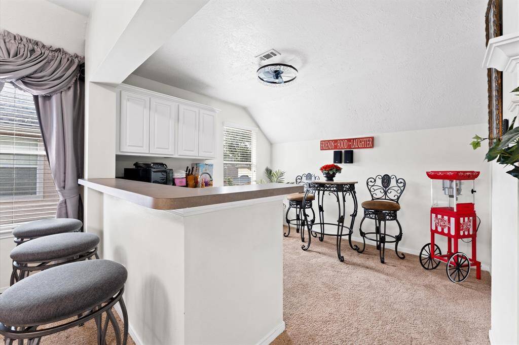 2nd floor wet bar and seating area