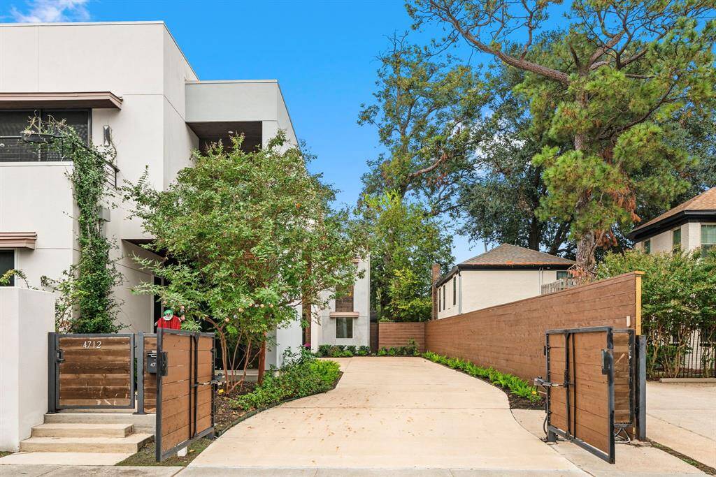 Gated community with only 2 units and NO HOA DUES! The extra long driveway allows for parking for 4+ vehicles INSIDE THE GATE, in addition to the 2 car garage.