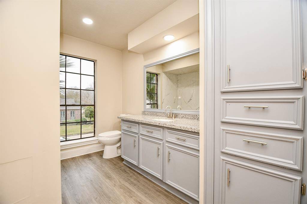 This inviting staircase, crafted with elegant details, gracefully ascends from the game room to a cozy loft area and then to additional bedrooms on the other side! The open design creates a sense of flow and connection between the two levels.
