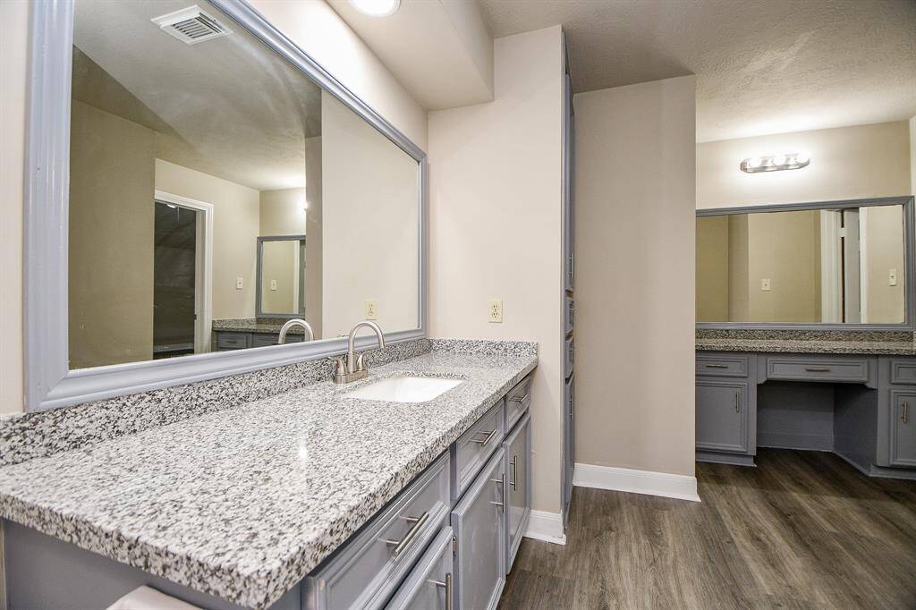 Located just upstairs from the kitchen & breakfast room, a captivating loft area awaits. This intimate retreat features a cozy fireplace and offers a unique vantage point overlooking the expansive game room below. The loft's inviting atmosphere is perfect for quiet contemplation or enjoying a good book.