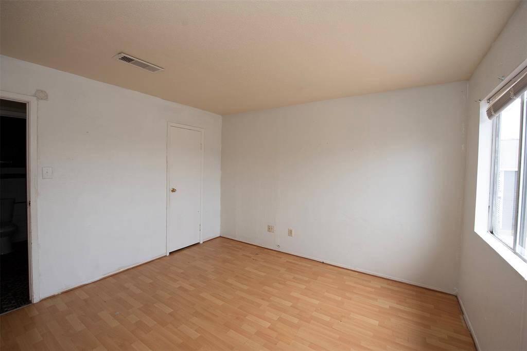 Another view of the guest room which could also fit a king bed.