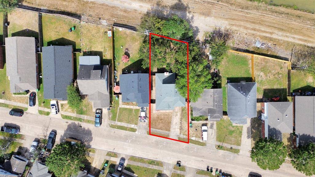 Ariel view with estimated lot lines.