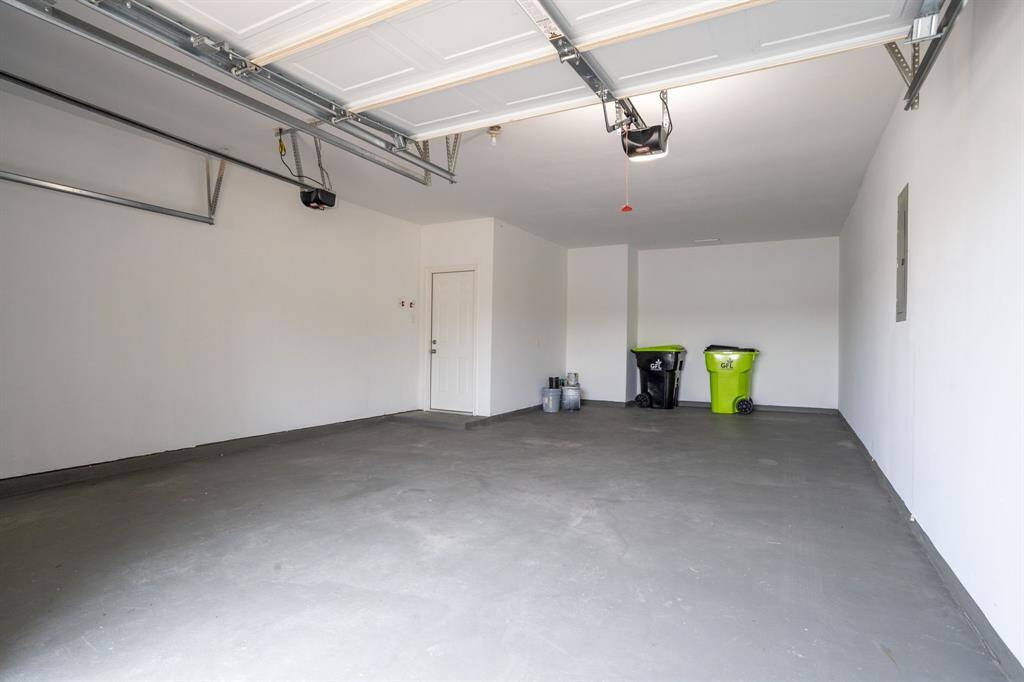 OVERSIZED 3 CAR TANDEM GARAGE!
