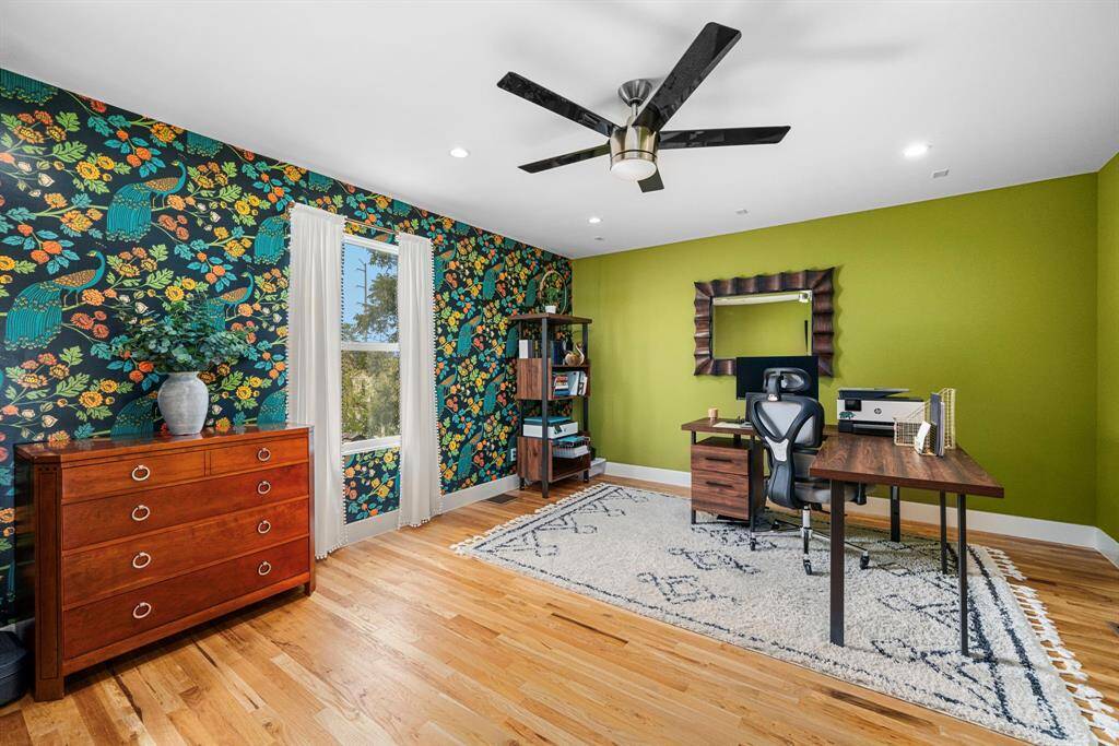 3rd floor flex room currently used as a home office. This space could easily be a media or billiards room, 5th bedroom, workout or hobby space of your choice.