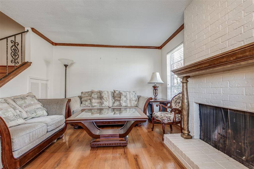 A charming fireplace that adds warmth and ambiance, making it a focal point for gatherings.