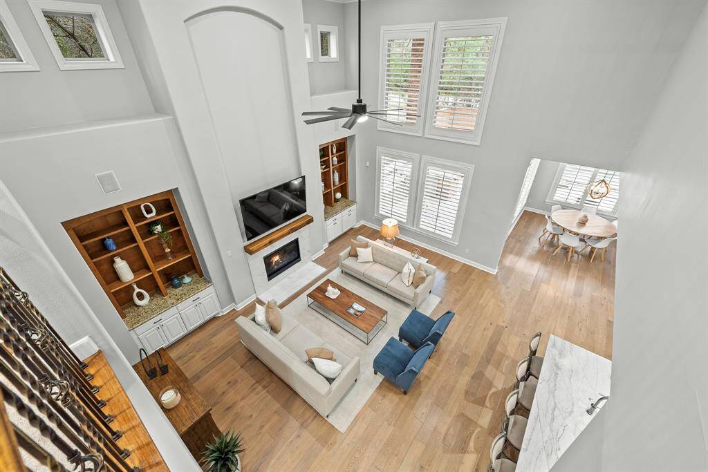 Covered patio perfect for entertaining, including grill, fridge, burner and mounted TV