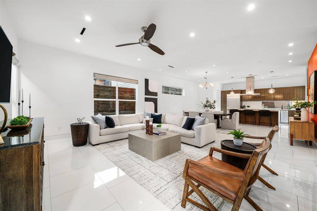The 1st floor offers an open concept living/dining/kitchen, an ideal setup for entertaining or family gatherings.