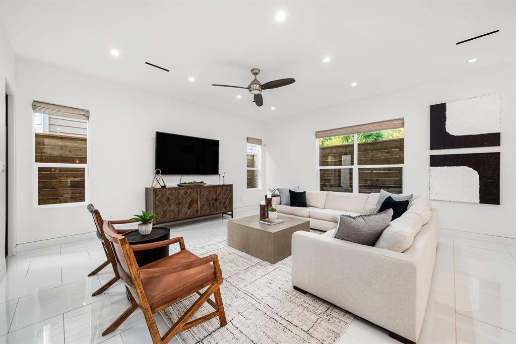 Enjoy a simple and neutral color palette that offers a background complimentary of many different furniture aesthetics. Dress this space up or down as you wish. Notice the modern, low profile air vents in the ceiling as well as the generous natural light that comes in from multiple the surrounding windows.