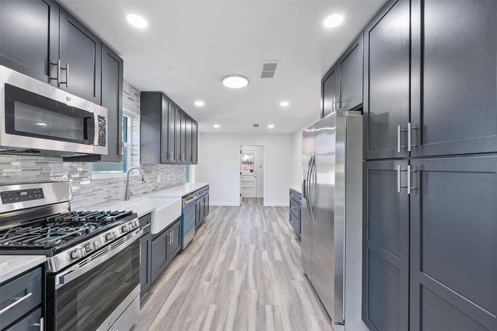 ALL NEW cabinetry. A dream kitchen!